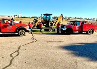 men with Water Well Trucks